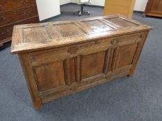 A George III panelled oak coffer (length 138cm).