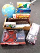 A box containing assorted board games,