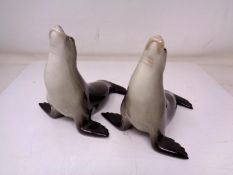 A pair of USSR china seal ornaments (height 13cm).