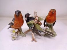 A group of three Goebel china birds (tallest 12.5cm).