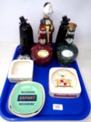 A tray of empty decanters including Spode, Wade, Wade ashtrays.
