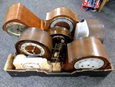 A box containing a quantity of antique and later clock cases and parts.