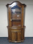 An Italian style glaze door display cabinet with cupboard fitted beneath.