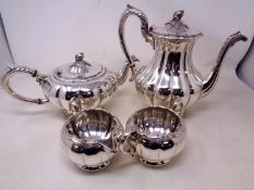 A four piece silver plated tea set.