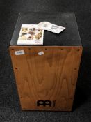 A Meinl Cajon drum.