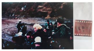 Vintage colour negative of Marilyn Monroe surrounded by the American troops while she visited Korea