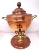 A copper and brass samovar.