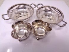 A pair of London silver clover leaf salts together with a further pair of Birmingham silver pierced