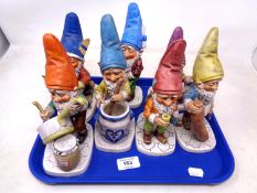 A tray of Goebel garden gnome figures.