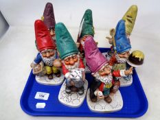 A tray of Goebel garden gnome figures.