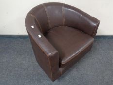 A contemporary tub chair.