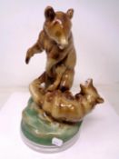 A Hungarian Zsolnay china bear group (height 30cm).