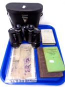 A tray containing Boots Pacer 10x50 field glasses in case, three volumes of grammar,