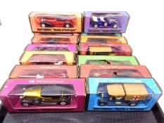 A tray of matchbox die cast classic cars.