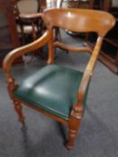 A Victorian mahogany armchair.