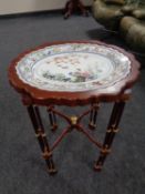 A Japanese style occasional table with scalloped lift off tray (diameter 48cm) with an inset