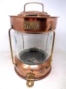 An antique copper and brass Meteorite Anchor ships lamp.