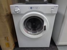 A White Knight 3kg tumble dryer.