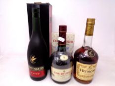 Four bottles of alcohol including Hennessey Cognac (0.7 Litres), Courvoisier Cognac (0.