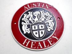 A cast iron wall plaque, Austin-Healey.