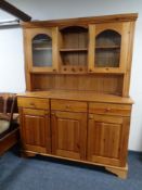 A pine triple door kitchen dresser.