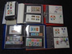 Five albums containing first day covers including Christmas Pantomimes, Royal Family, Isaac Newton,