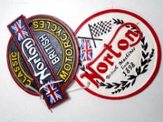 Two cast iron wall plaques, Norton motorcycles.