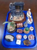 A tray containing Border Fine Arts figure, In From the Cold,