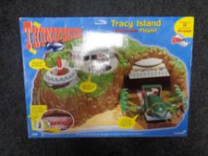 A Carlton Thunderbirds Tracy Island electronic playset.