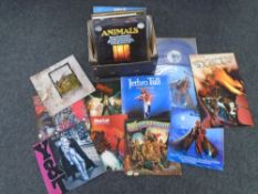 A box containing vinyl LPs including Michael Jackson, Meatloaf, Animals, Judas Priest, Jethro Tull,