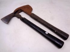 Two fireman's axes.