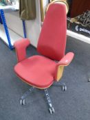 An IKEA Jerrik adjustable high backed office armchair.