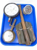 A 20th century military issue shovel with leather cover,