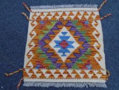 A Chobi Kilim 49 cm x 49 cm