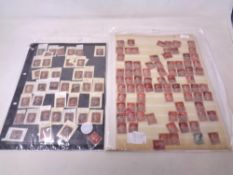 Two sheets of Penny Red stamps.