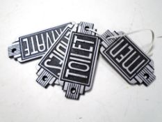 Four cast iron Art Deco signs, Men, Ladies, Private and Toilet.