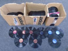 Three boxes containing vinyl 78s on Colombia, HMV and Philips labels.