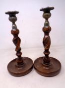 A pair of Edwardian barley twist candlesticks.