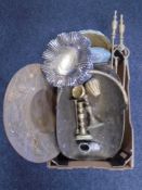 A box containing antique metal wares including a brass log basket, candlesticks, plated ware,
