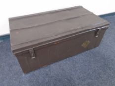 A vintage tin trunk.