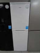 A Candy upright fridge-freezer.