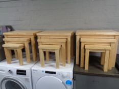 Three nests of three pine tables.