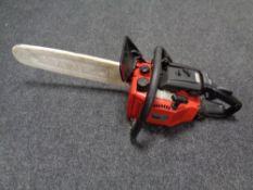 A Tromeca E390 petrol chain saw.