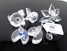 Five Swarovski crystal ornaments, elephant, puffer fish, panda cub, flower and two mice on cheese.