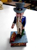 A cast iron Uncle Sam money box.