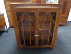 A 1930's walnut double door bookcase.