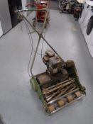 A petrol lawn mower with Briggs & Stratton 3 horsepower petrol engine.