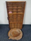 A printer's tray together with a rustic wooden fruit bowl.