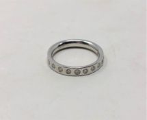 A platinum twelve stone diamond half eternity ring, size G/H, 4.3g.