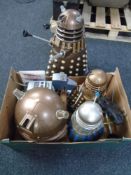 A box containing four Doctor Who remote control toys together with a Doctor Who voice changing